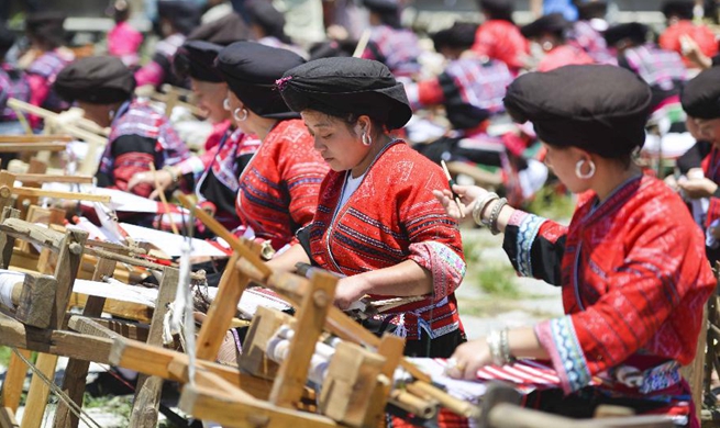 Annual "drying clothes" festival celebrated in Longji Township, south China's Guangxi