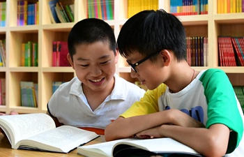 Children participate in various activities during summer vacation in China